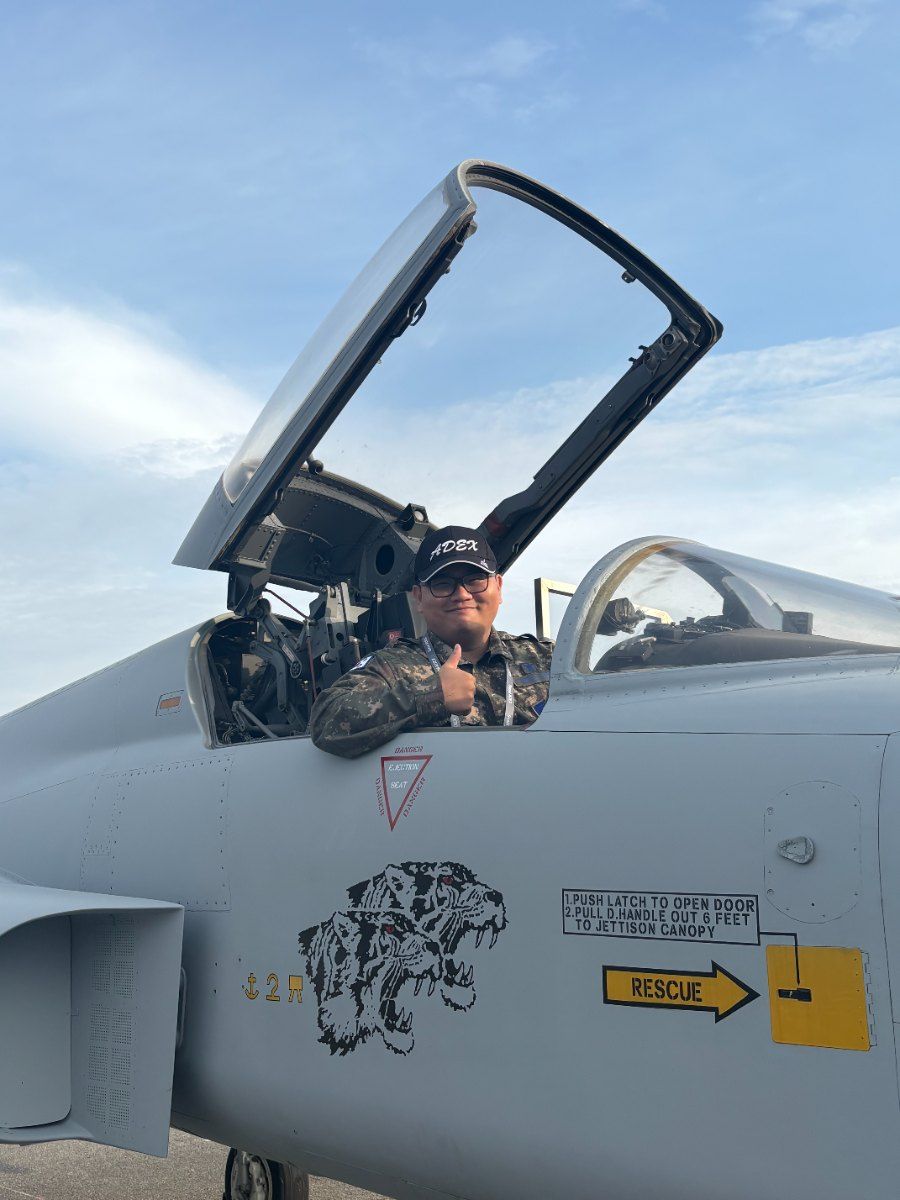 Brian Kim in the cockpit of a ROKAF jet at Seoul ADEX
