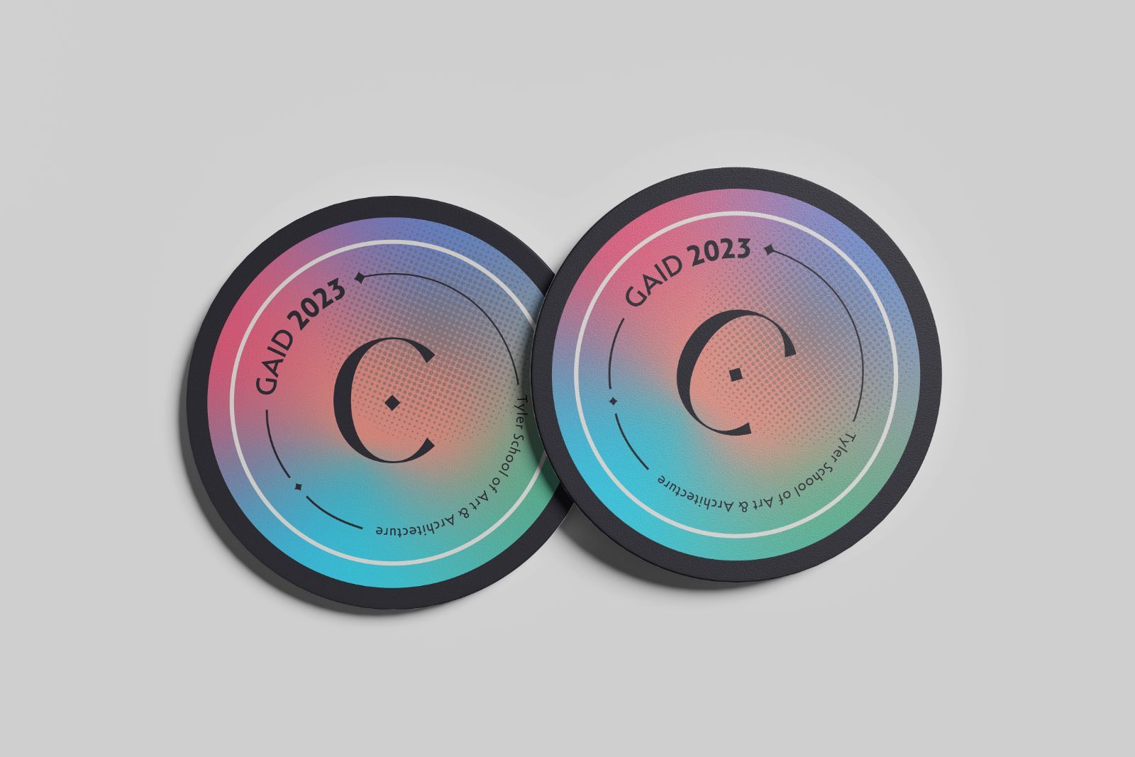 Two coasters with the responsive C mark over a halftone gradient